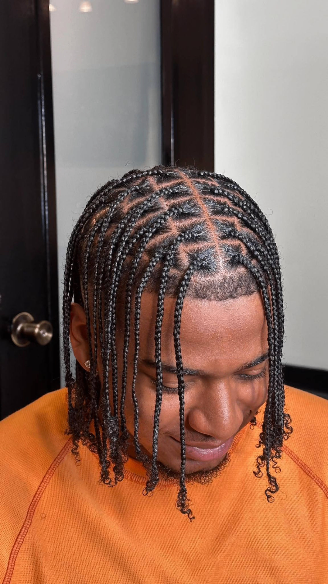 Large knotless braids with neat square parts